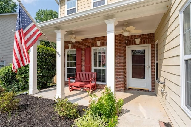 3362 Palm Cir NW, Kennesaw, GA 30144 - entrance to property featuring a ceiling fan, covered porch, and brick siding