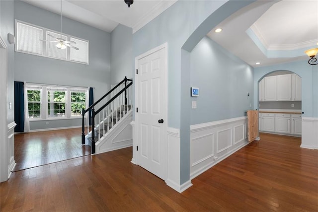 3362 Palm Cir NW, Kennesaw, GA 30144 - corridor with arched walkways, crown molding, wood-type flooring, stairway, and recessed lighting