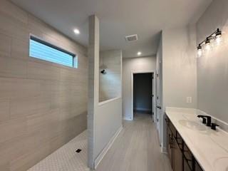 5444 Miravista Way, Hoschton, GA 30548 - full bath featuring walk in shower, double vanity, wood finished floors, and recessed lighting