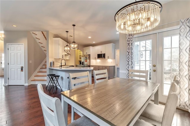 4360 Canterbury Walk Dr, Duluth, GA 30097 - dining area featuring stairway, a chandelier, plenty of natural light, and recessed lighting