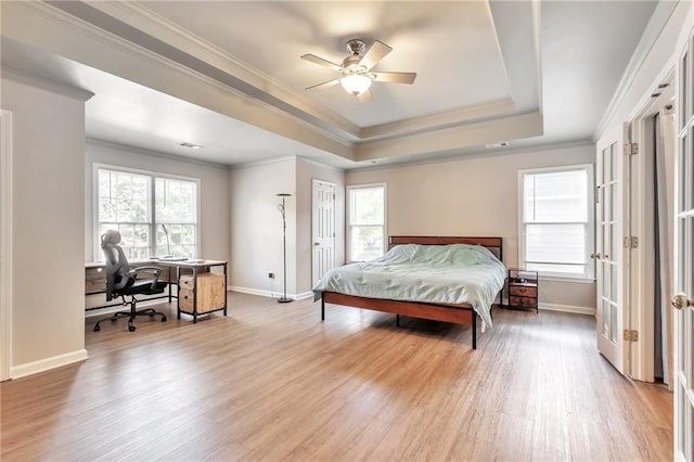 4360 Canterbury Walk Dr, Duluth, GA 30097 - bedroom with multiple windows, ornamental molding, baseboards, an office area, and light wood finished floors