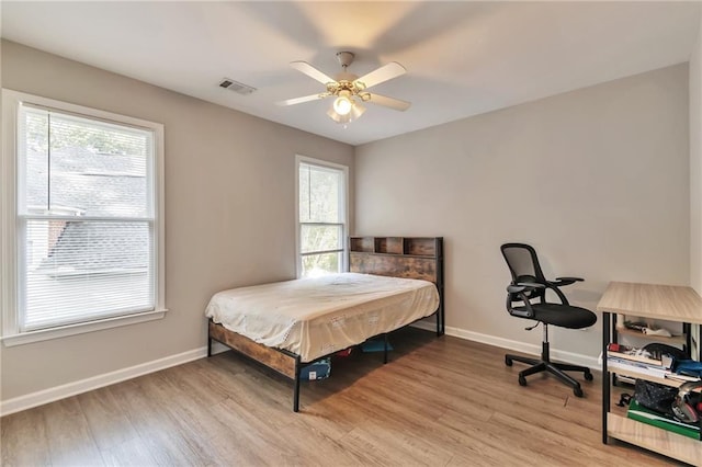 4360 Canterbury Walk Dr, Duluth, GA 30097 - bedroom featuring wood finished floors, multiple windows, and baseboards