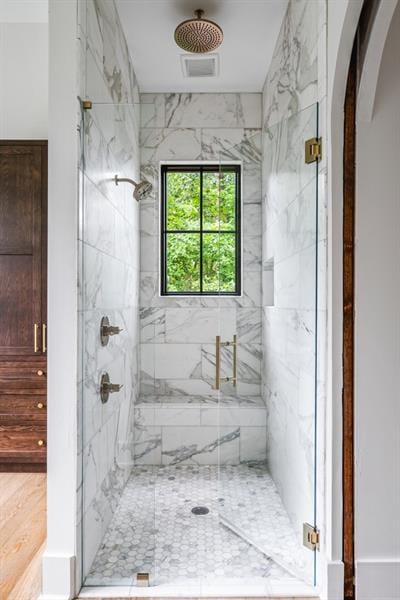 bathroom featuring walk in shower