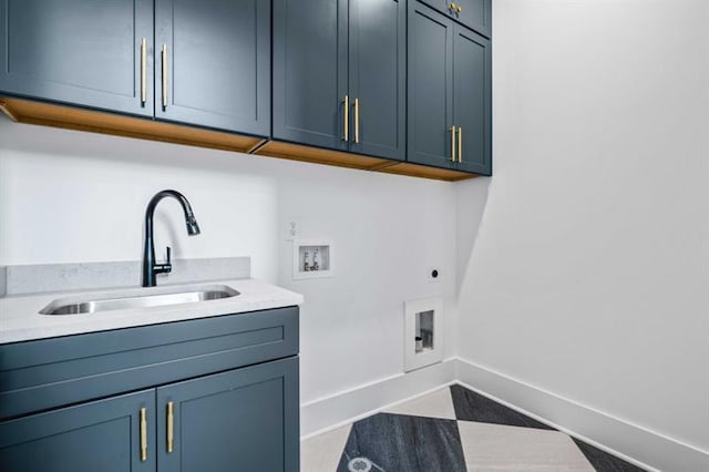 laundry area featuring cabinets, sink, washer hookup, and hookup for an electric dryer