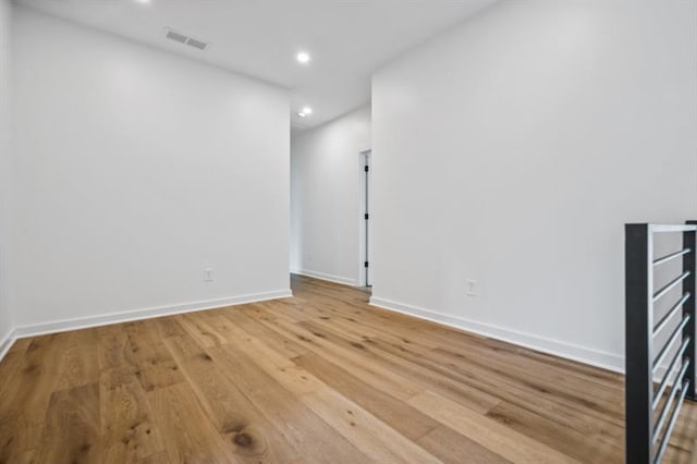 unfurnished room featuring wood-type flooring