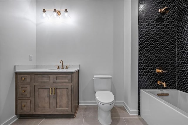 full bathroom featuring tile patterned flooring, vanity, tiled shower / bath combo, and toilet