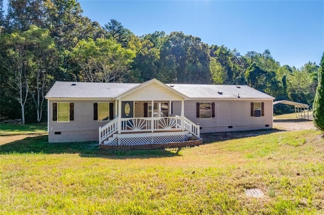 back of house featuring a lawn