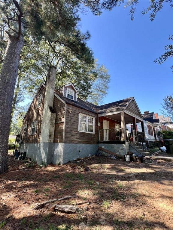 1876 Madrona St NW, Atlanta, GA 30318 - view of front facade featuring covered porch