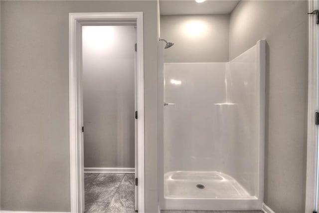 bathroom with a shower