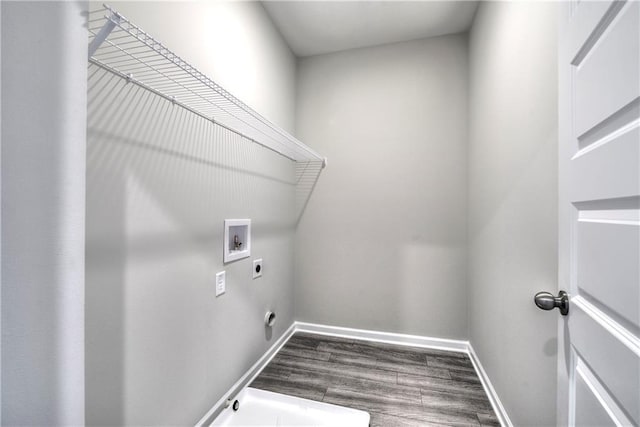 laundry area with hookup for a washing machine, hardwood / wood-style flooring, and electric dryer hookup