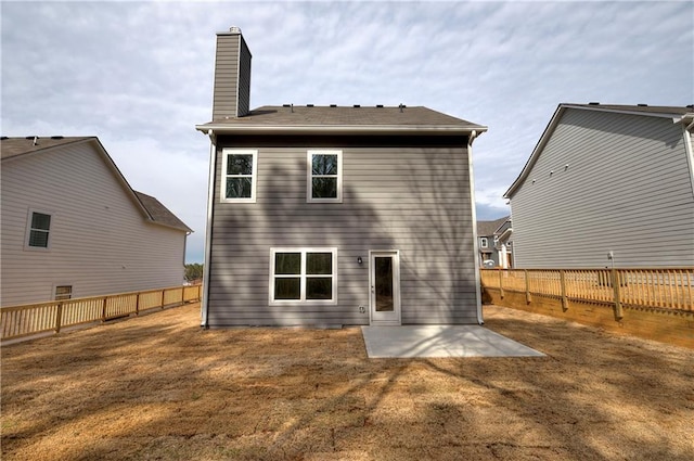 rear view of house featuring a patio area