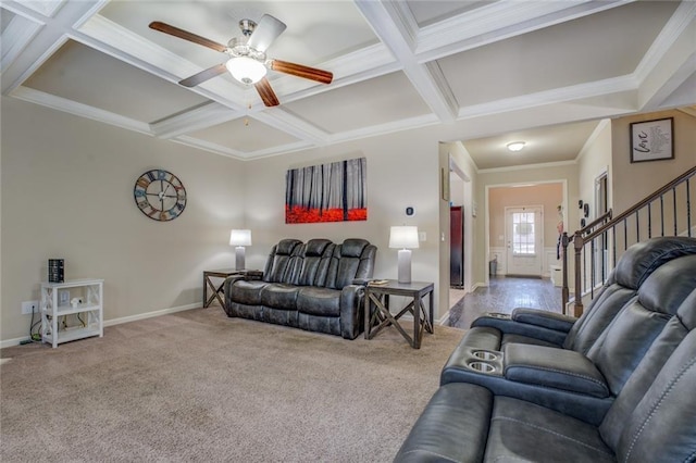 living area with carpet flooring, coffered ceiling, beamed ceiling, baseboards, and stairs