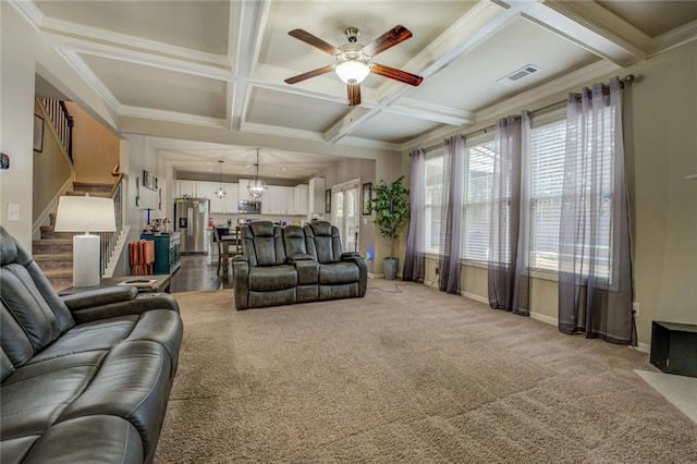 carpeted living room featuring beam ceiling, visible vents, stairway, coffered ceiling, and baseboards