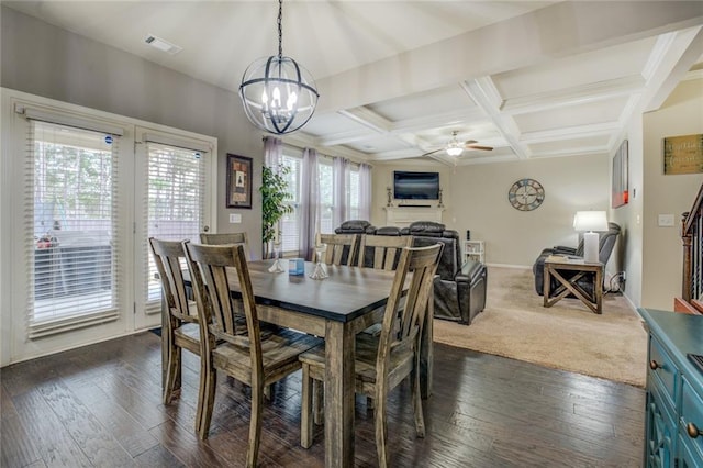 dining area with ceiling fan with notable chandelier, coffered ceiling, visible vents, dark wood-style floors, and beamed ceiling