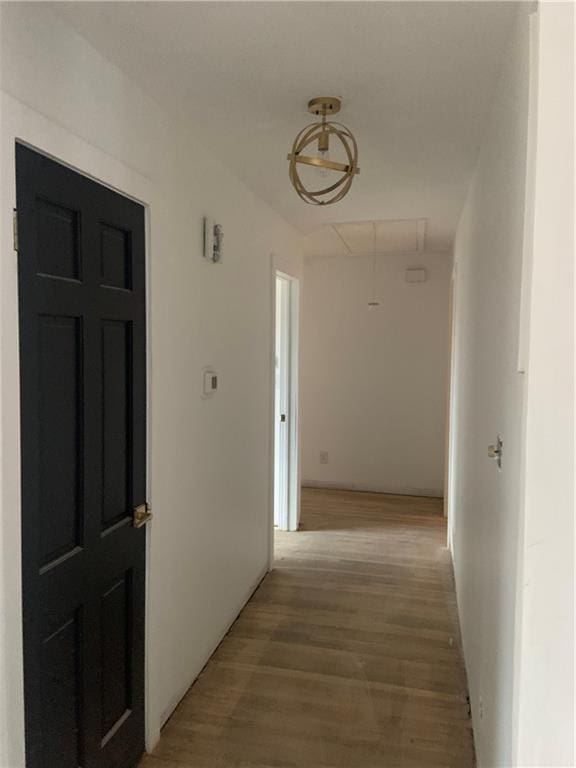 hallway featuring hardwood / wood-style floors