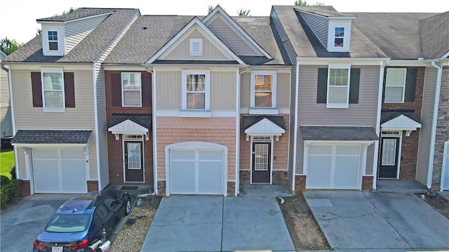 3176 Creston Park Ct, Duluth, GA 30096 - townhome / multi-family property with driveway, a garage, and stone siding