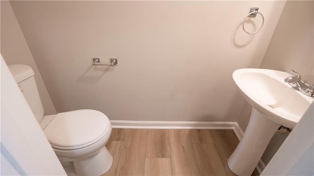 3176 Creston Park Ct, Duluth, GA 30096 - half bath with toilet and wood finished floors
