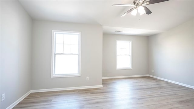 3176 Creston Park Ct, Duluth, GA 30096 - spare room featuring ceiling fan and light wood-style floors