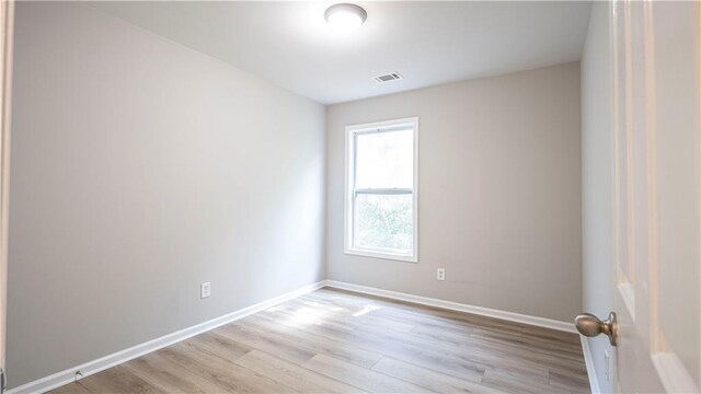 3176 Creston Park Ct, Duluth, GA 30096 - empty room with light wood finished floors and baseboards