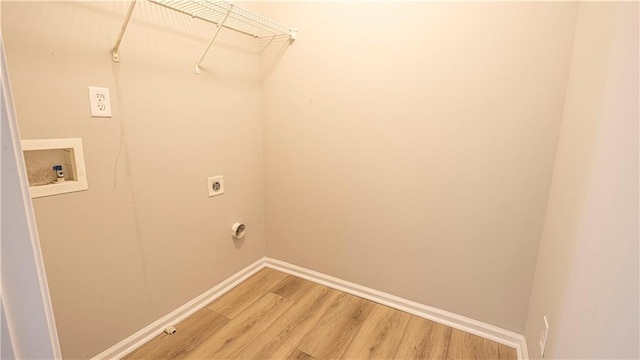 3176 Creston Park Ct, Duluth, GA 30096 - laundry room with hookup for a washing machine, electric dryer hookup, and light wood-style flooring