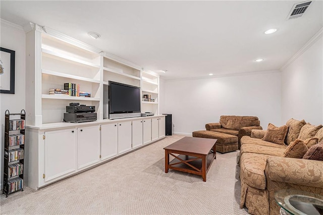 living room with ornamental molding, light colored carpet, and built in shelves