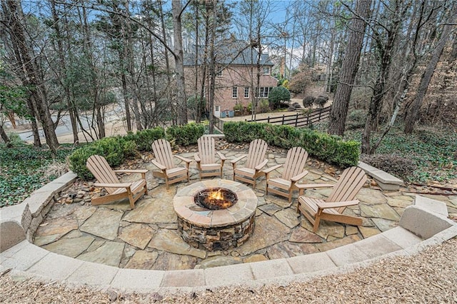 view of patio with a fire pit