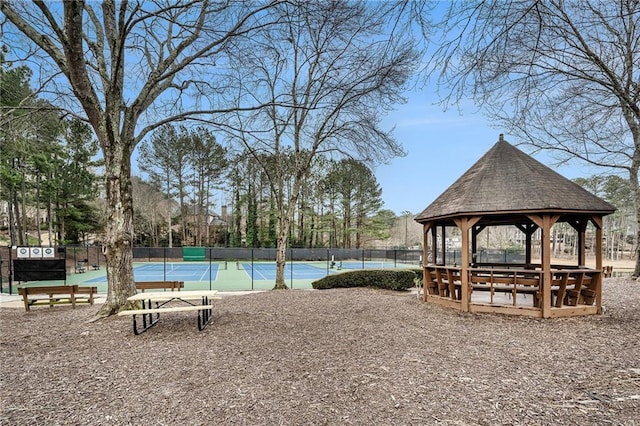 view of community with a gazebo and tennis court