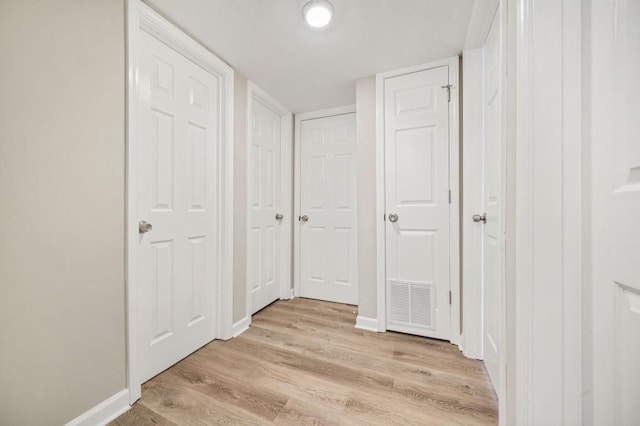 hall featuring light hardwood / wood-style floors