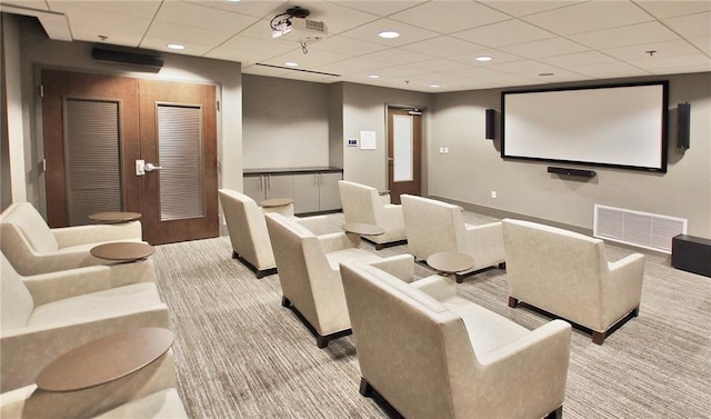 home theater featuring recessed lighting, visible vents, carpet, and a drop ceiling