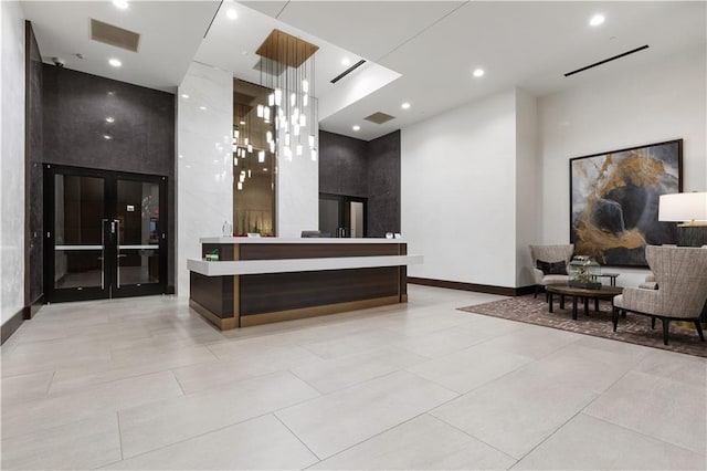 reception featuring visible vents and french doors