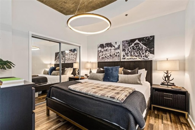 bedroom featuring a closet and wood finished floors
