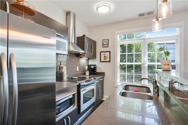 1300 Dekalb Ave NE Unit 731, Atlanta, GA 30307 - kitchen with stainless steel appliances, a sink, ventilation hood, backsplash, and decorative light fixtures