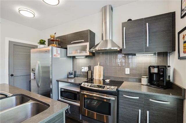 1300 Dekalb Ave NE Unit 731, Atlanta, GA 30307 - kitchen featuring stainless steel appliances, wall chimney range hood, a sink, tasteful backsplash, and modern cabinets