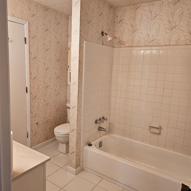 bathroom featuring a textured ceiling, tile patterned flooring, vanity, and wallpapered walls