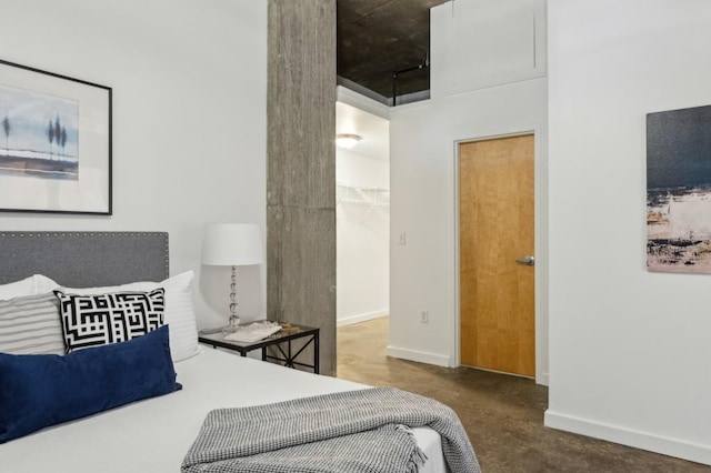 bedroom featuring a closet and a spacious closet