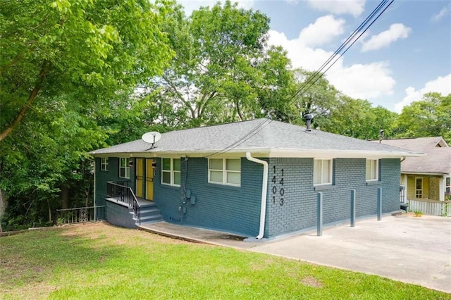 1401 Pine Ave, East Point, GA 30344 - view of front of property with a front lawn and brick siding