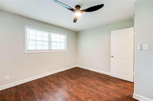 1401 Pine Ave, East Point, GA 30344 - spare room featuring dark wood finished floors and ceiling fan