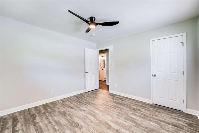 1401 Pine Ave, East Point, GA 30344 - unfurnished bedroom with wood finished floors and a ceiling fan