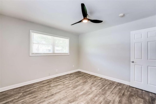 1401 Pine Ave, East Point, GA 30344 - spare room with wood finished floors, a smoke detector, and ceiling fan