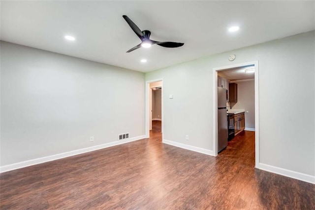 1401 Pine Ave, East Point, GA 30344 - spare room featuring a ceiling fan, dark wood-style flooring, and recessed lighting