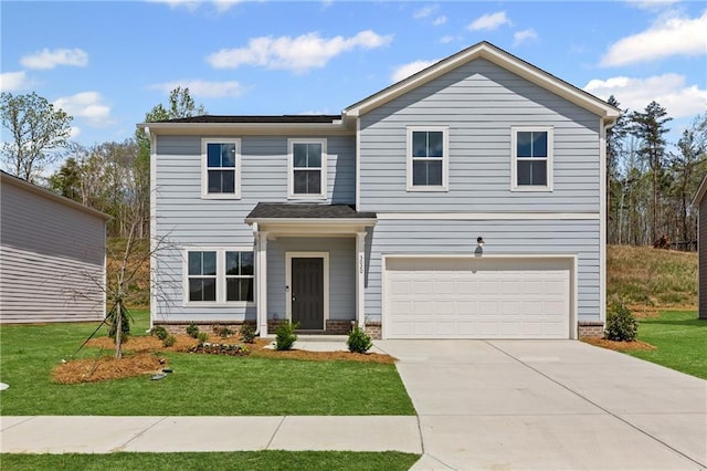 3020 Orwell Dr, Gainesville, GA 30507 - view of front of property with concrete driveway, a front lawn, brick siding, and a garage
