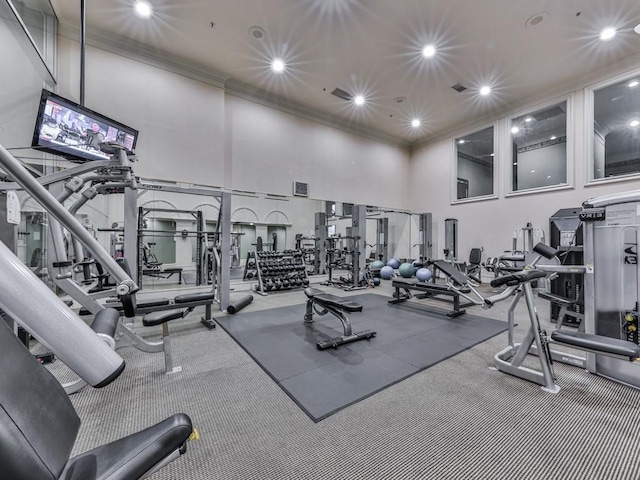 3334 Peachtree Rd NE Unit 614, Atlanta, GA 30326 - exercise room with a high ceiling, ornamental molding, and recessed lighting
