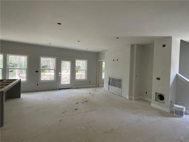 unfurnished living room with a fireplace