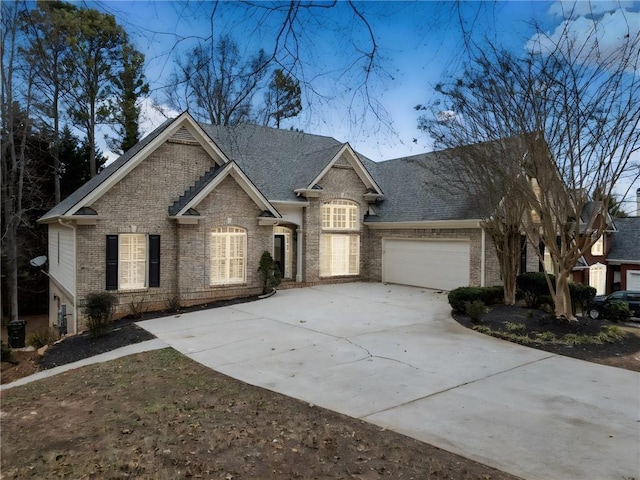 view of front of property featuring a garage