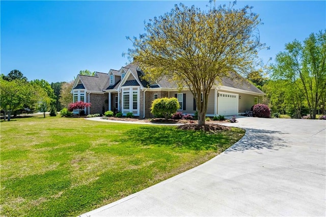 view of front of property with a garage, concrete driveway, brick siding, and a front lawn