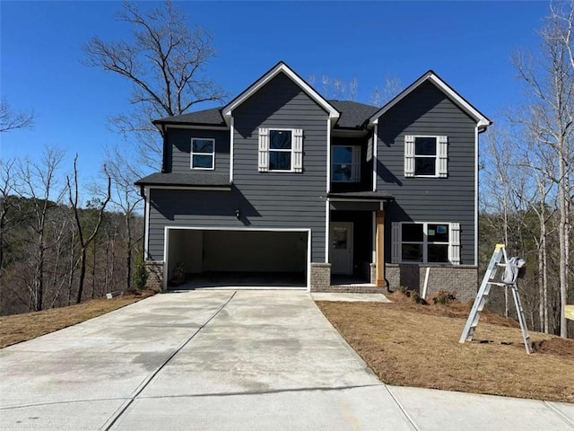 5518 Legacy Trl, Douglasville, GA 30135 - view of front facade featuring a garage, concrete driveway, and brick siding