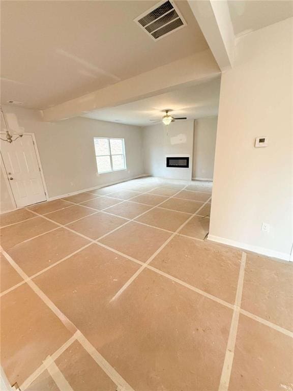 5518 Legacy Trl, Douglasville, GA 30135 - unfurnished living room featuring baseboards, tile patterned floors, and a fireplace
