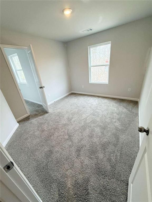 5518 Legacy Trl, Douglasville, GA 30135 - empty room with carpet and baseboards