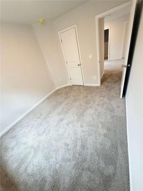 5518 Legacy Trl, Douglasville, GA 30135 - carpeted spare room featuring baseboards