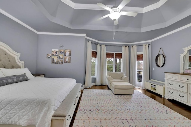 bedroom with ceiling fan, crown molding, and dark wood-type flooring